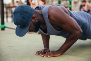 man doing calisthenics push workout outdoor